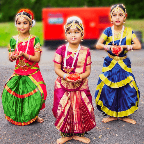 three young children who are Bharatanatyam dancers